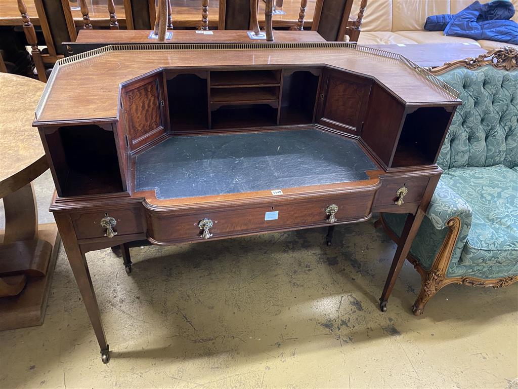 A late 19th century George III style mahogany Carlton House desk, length 122cm, depth 58cm, height 102cm